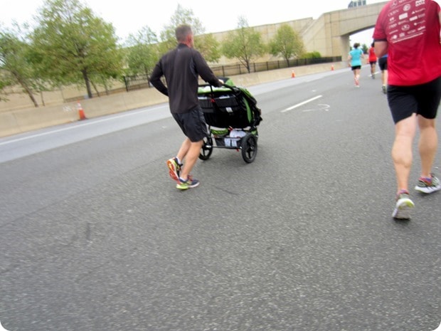 guy racing with a stroller