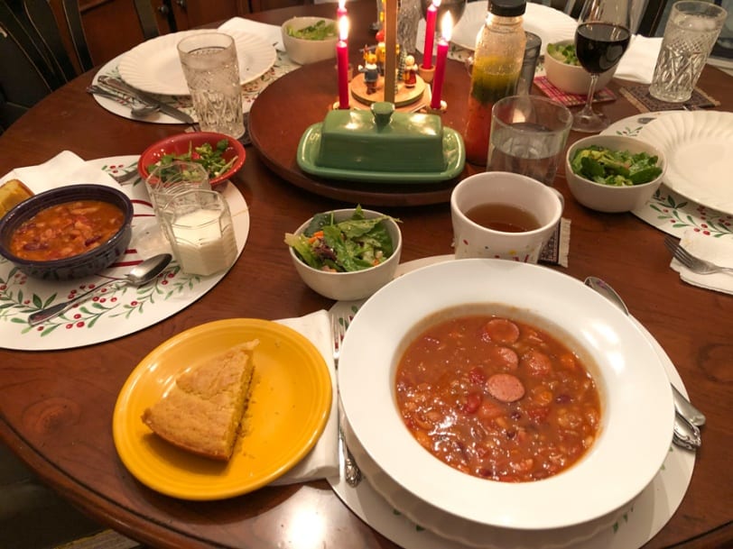 bean and sausage soup with cornbread and salad