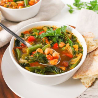 Instant Pot vegetable soup with chickpeas in a white bowl