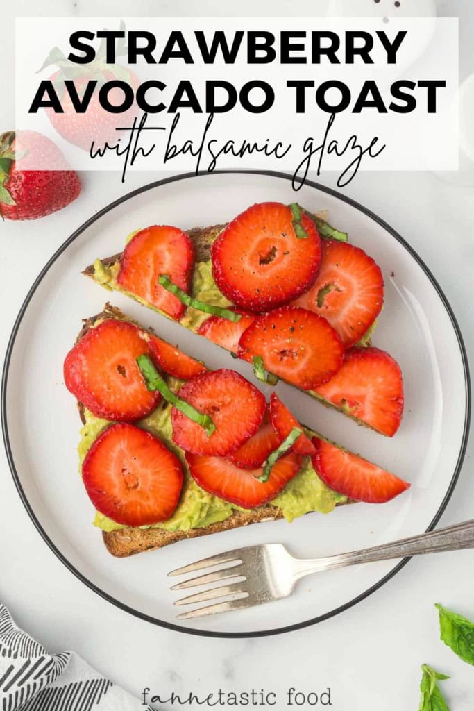 avocado strawberry toast with balsamic glaze on a white plate
