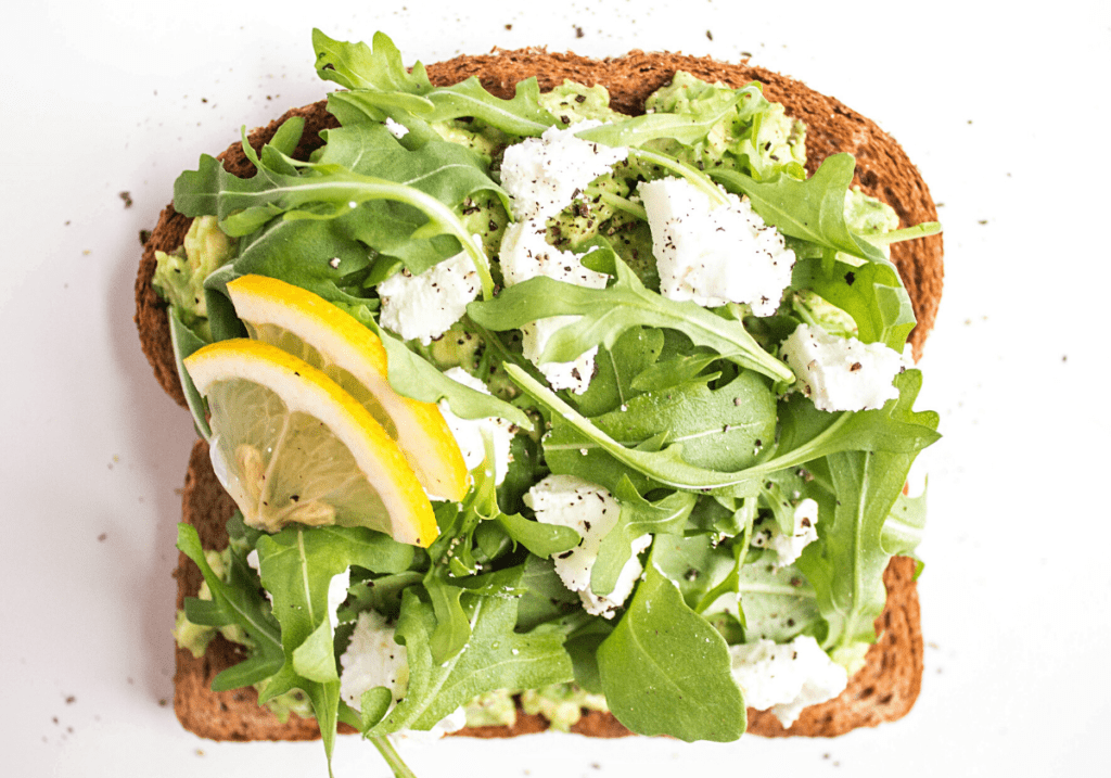 Smashed Avocado Toast With Goat Cheese And Arugula