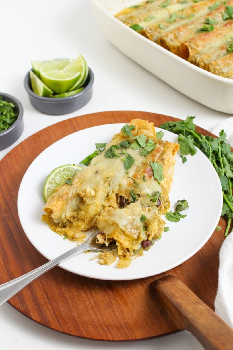 slow cooker chicken enchiladas verde with a fork