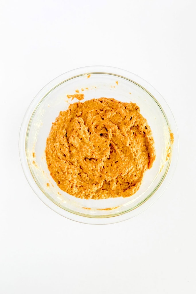carrot cake muffin batter in a glass bowl
