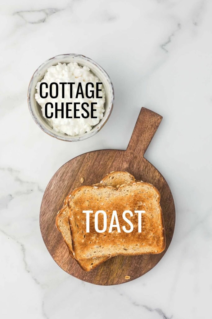 cottage cheese and toast on a wooden platter