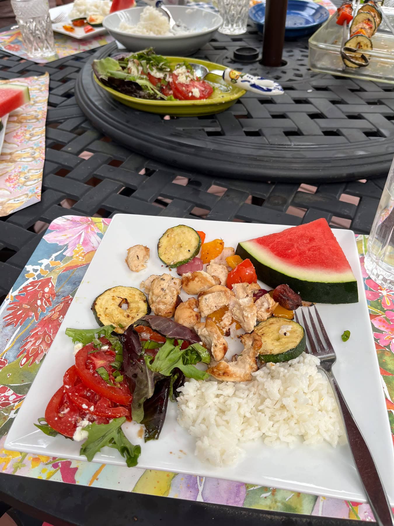 chicken and veggies with rice and watermelon