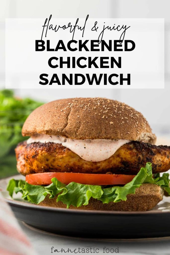 blackened chicken sandwich with lettuce, tomato, and creamy chipotle sauce on a bun