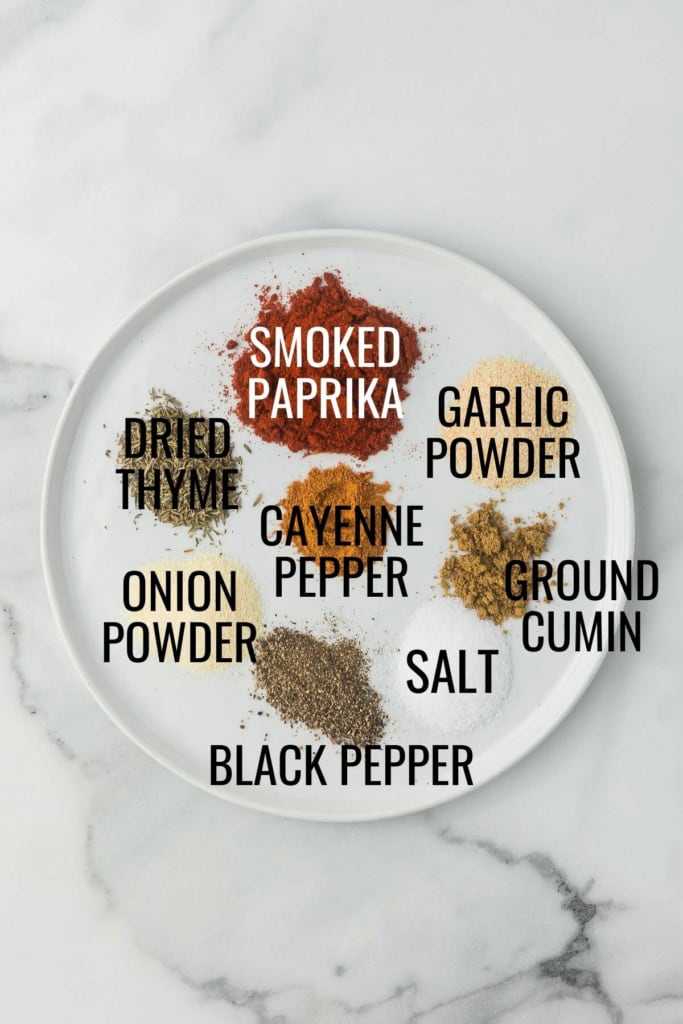 ground spices on a white plate